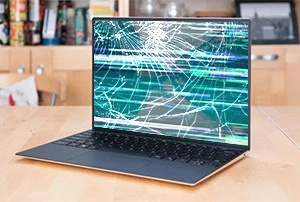 Cracked and glitching screen on laptop