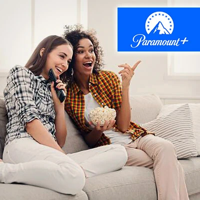 Two young college students enjoying streaming Paramount+