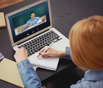 Student viewing online class on laptop